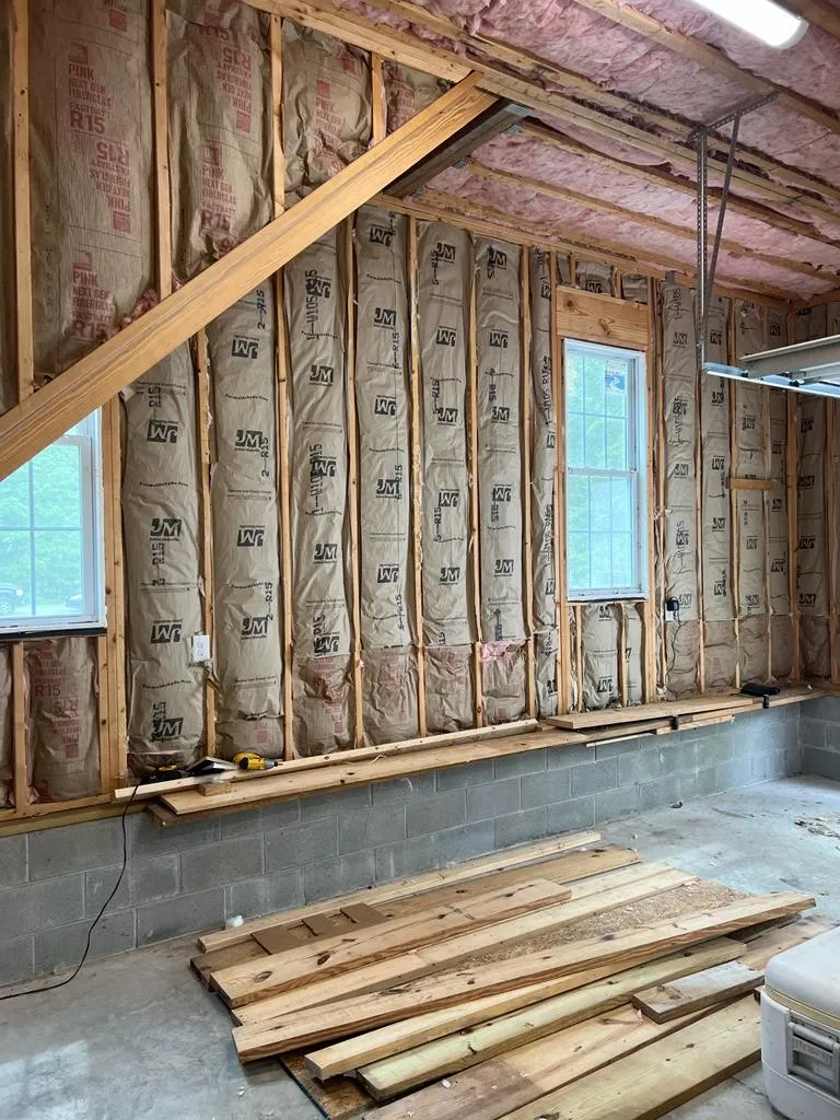 Attic insulated with spray foam and batt