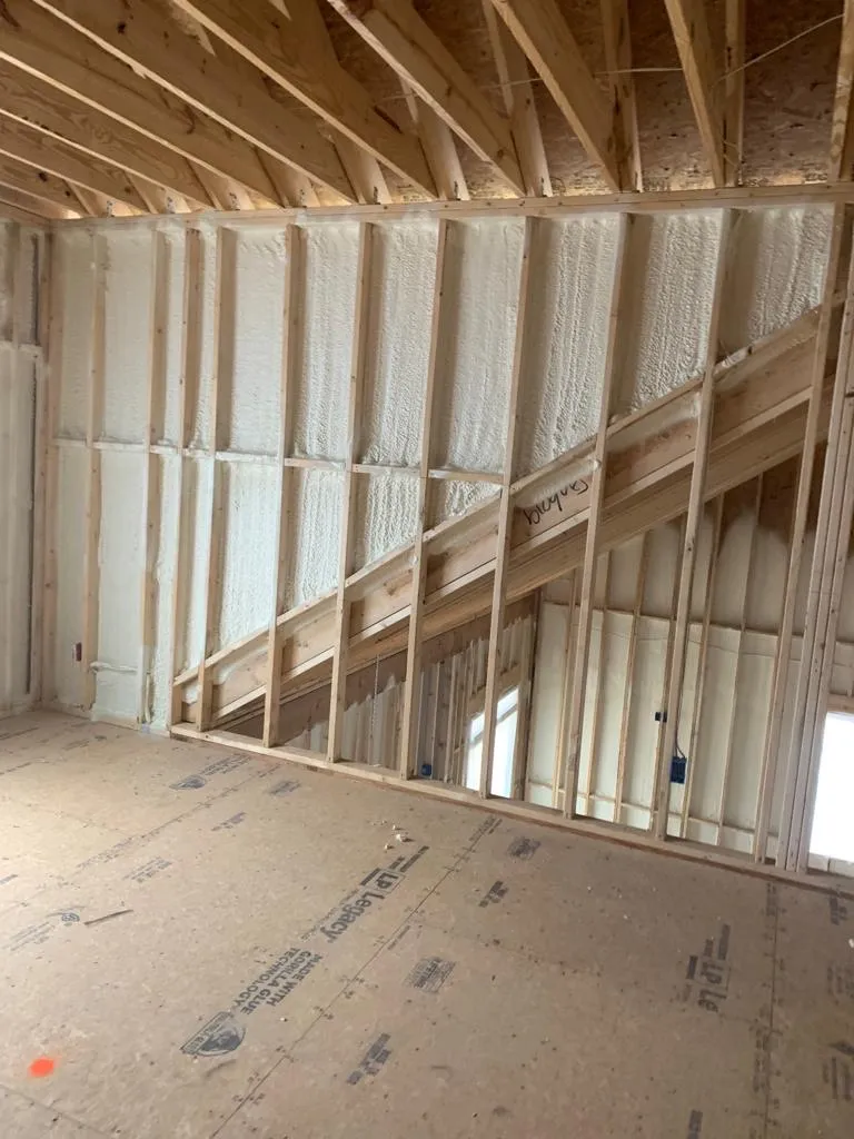 Spray foam applied inside wall framing